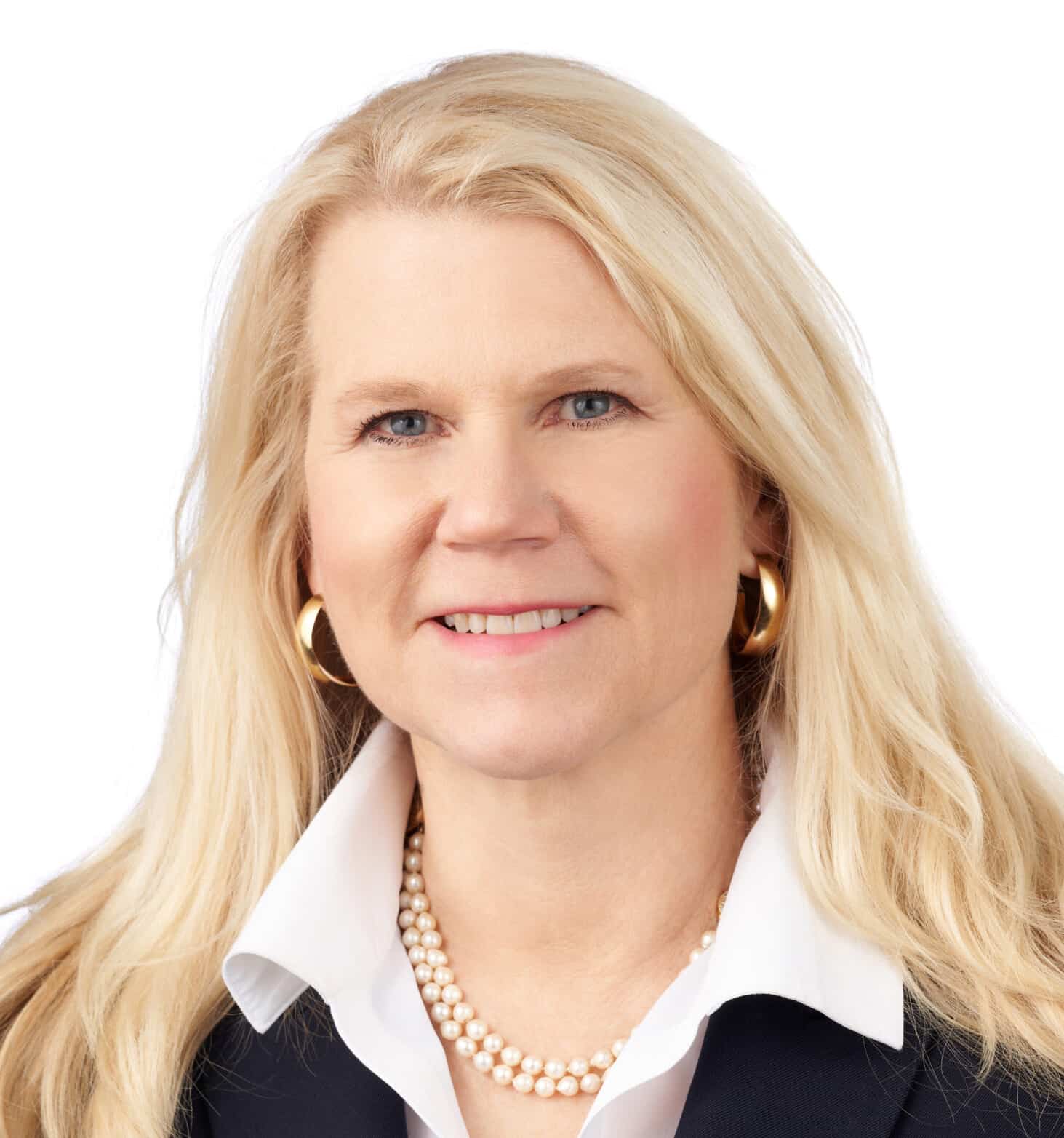 A headshot of associate Ellen Jordan. She has long, blonde hair, and is wearing a black suit.