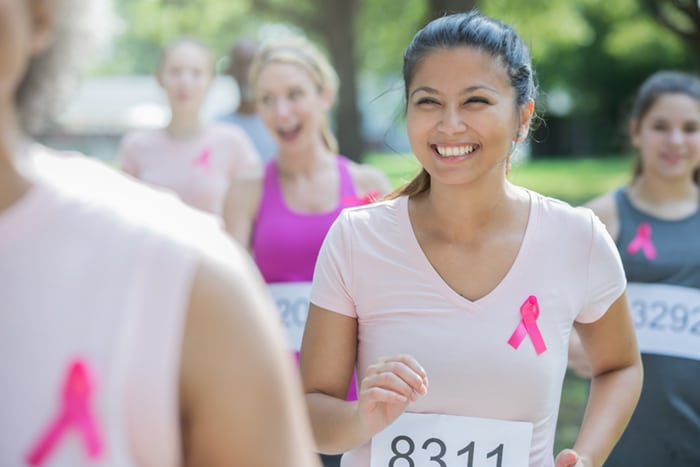 A woman running in a marathon.