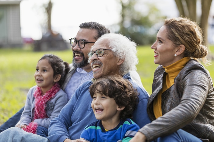 A family playing in the park.