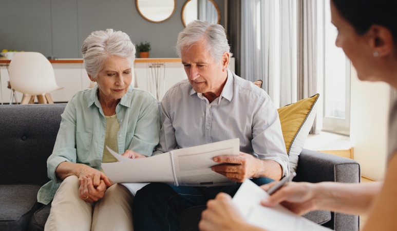 An older couple reviewing documents.