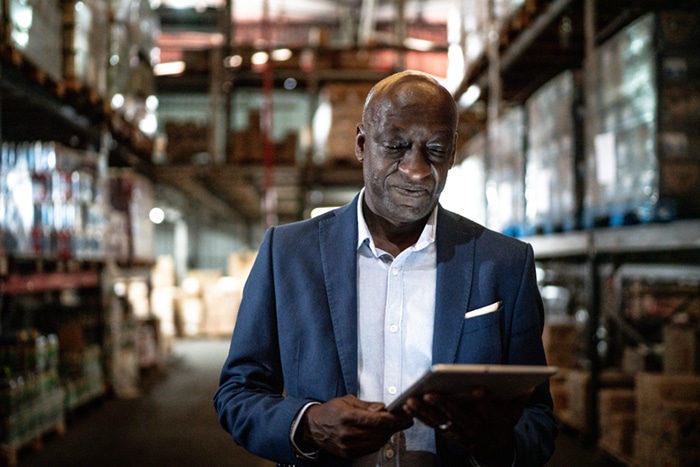 A businessman using a tablet.