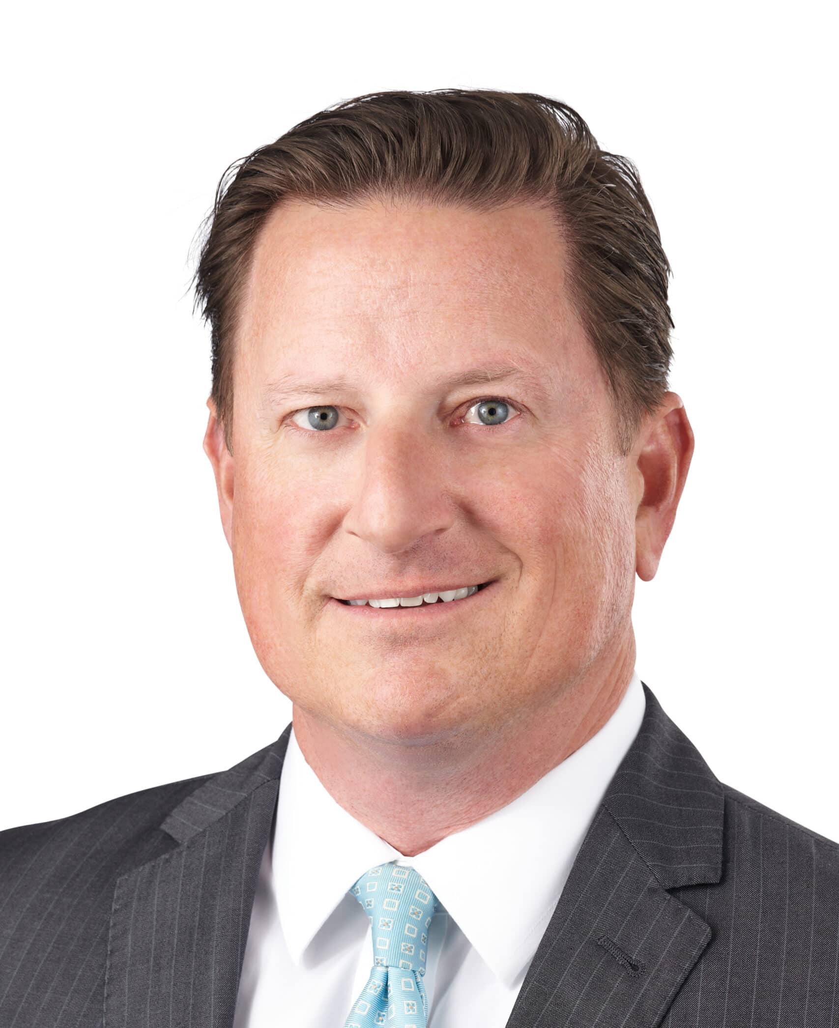 A headshot of associate Jon Bonvetti. He has short, brown hair, and he is wearing a pinstriped suit.